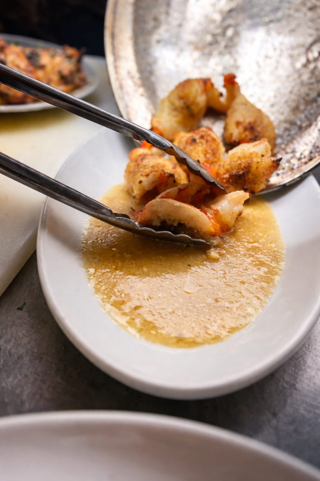 Shrimp served tableside from the pan